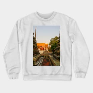 Third sidewalk view to ornate roof, flanked from parts of Chedis at Wat Pho. Crewneck Sweatshirt